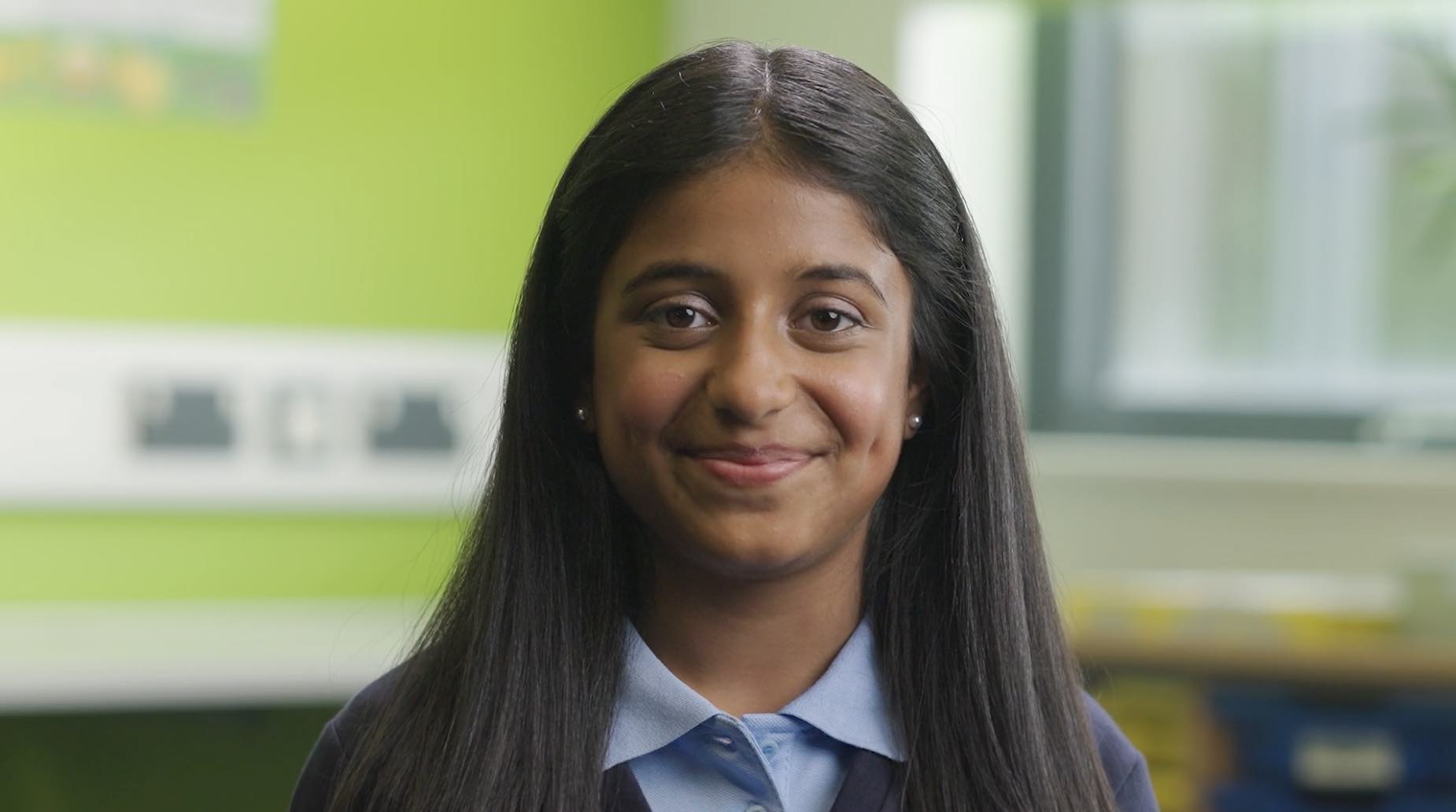 School girl smiling at camera