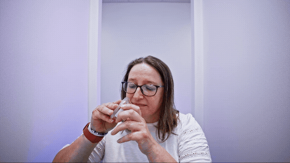 Sensory panellists at Mondelēz International new research facility with animated words appearing around - cocoa, sweet and chewy