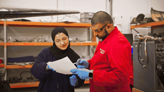 FPV drone tour at Solihull College flying through aircraft mechanic room into turbine to transition to a photography studio