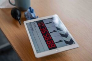 iPad clapperboard on table says Technical Drive scene 1 take 1.