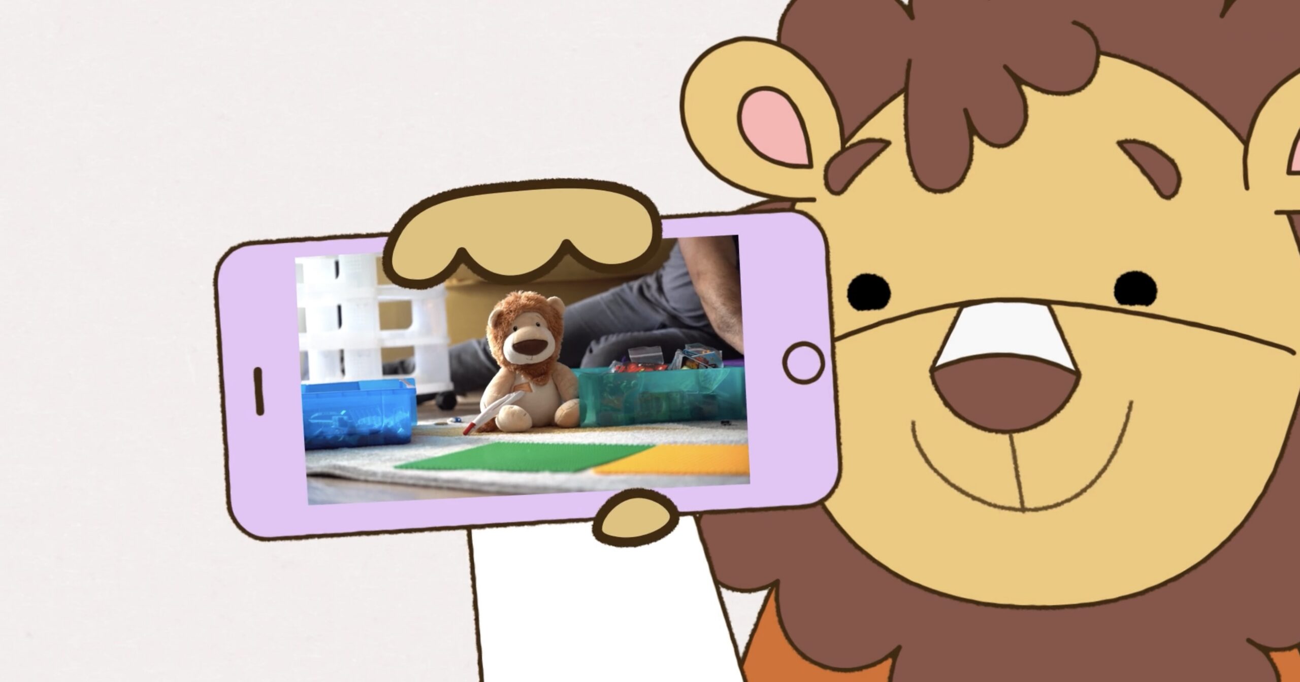 Olly the brave animated lion mascot holding up pink illustrated phone to camera with a live action shot of the olly the brave toy in it