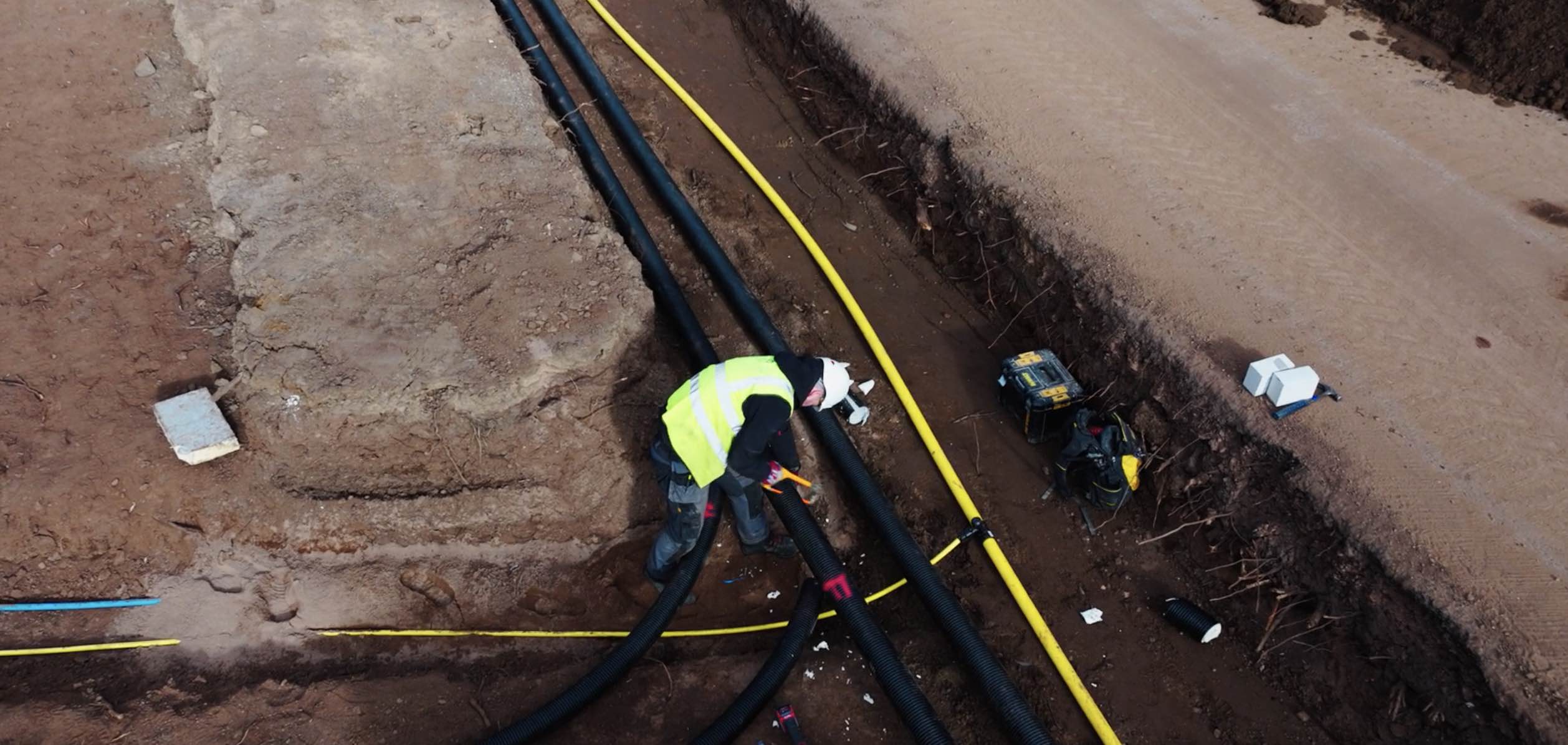 Top down shot of engineer working on heat pumps in Edinburgh